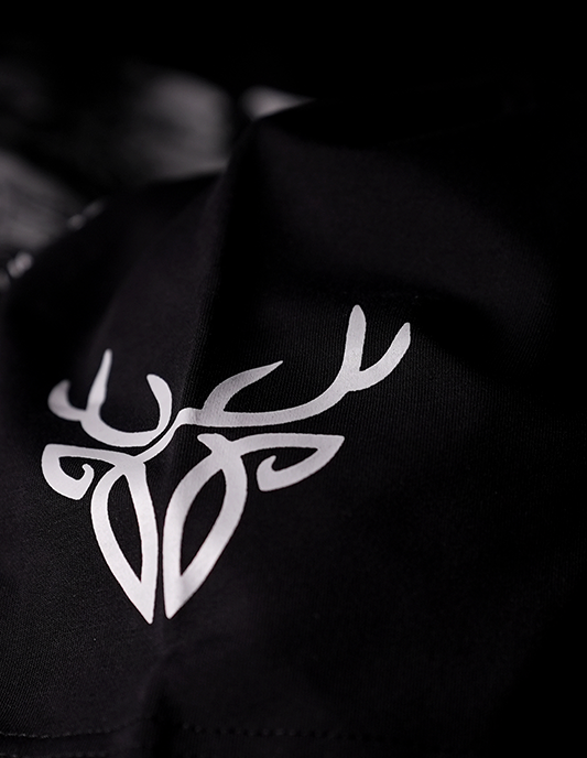 White deer antler design on a black background