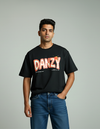 Man wearing a black t-shirt with 'DANZY' printed on it against a gray background